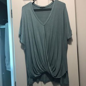 Crossover blouse with hem detail